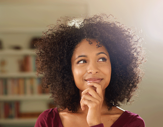 woman thinking about what to cover under her storage insurance policy