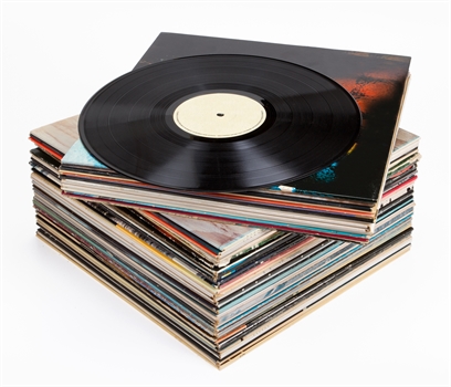 A stack of vinyl LPs
