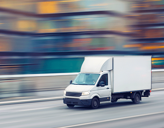house hold items being transported by a transit van 